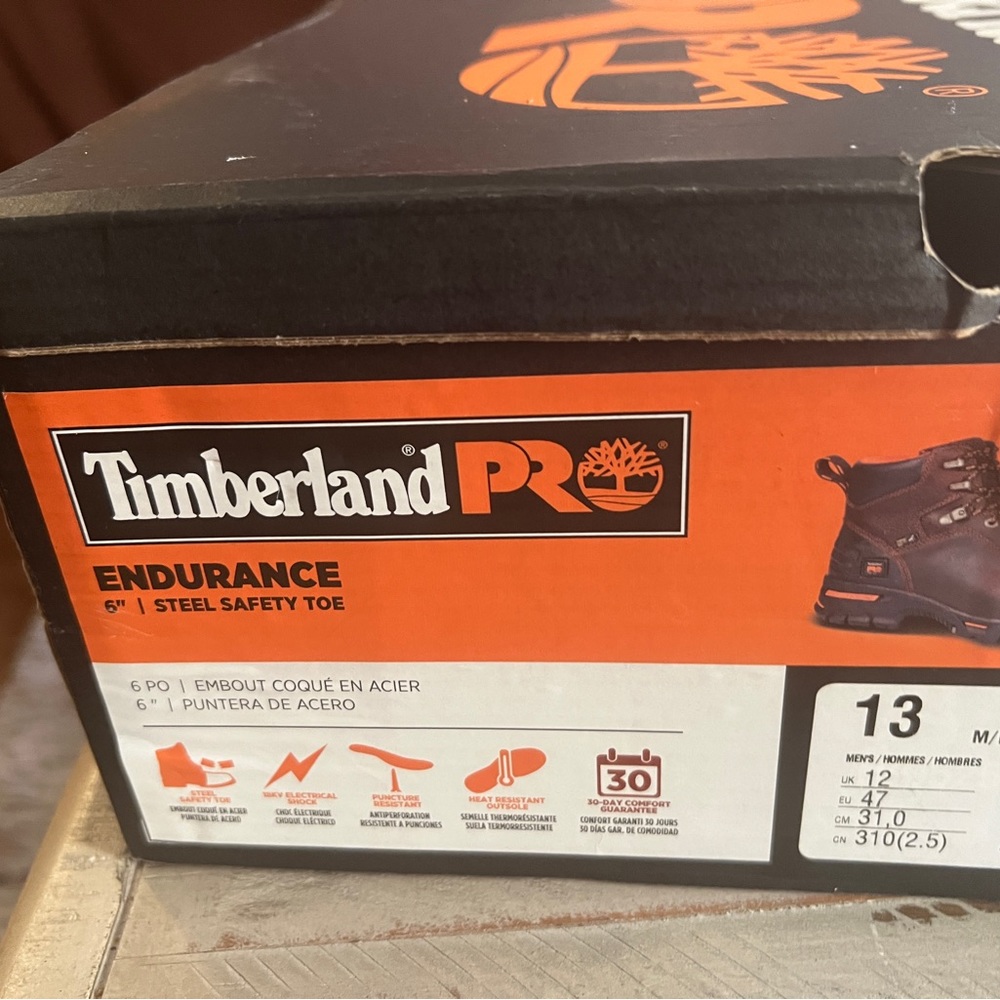Men’s size 13 work boots, never worn, smoke free home